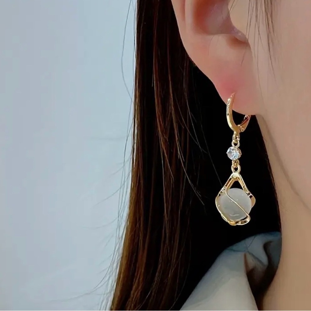 Elegant Gold and White Drop Earrings.